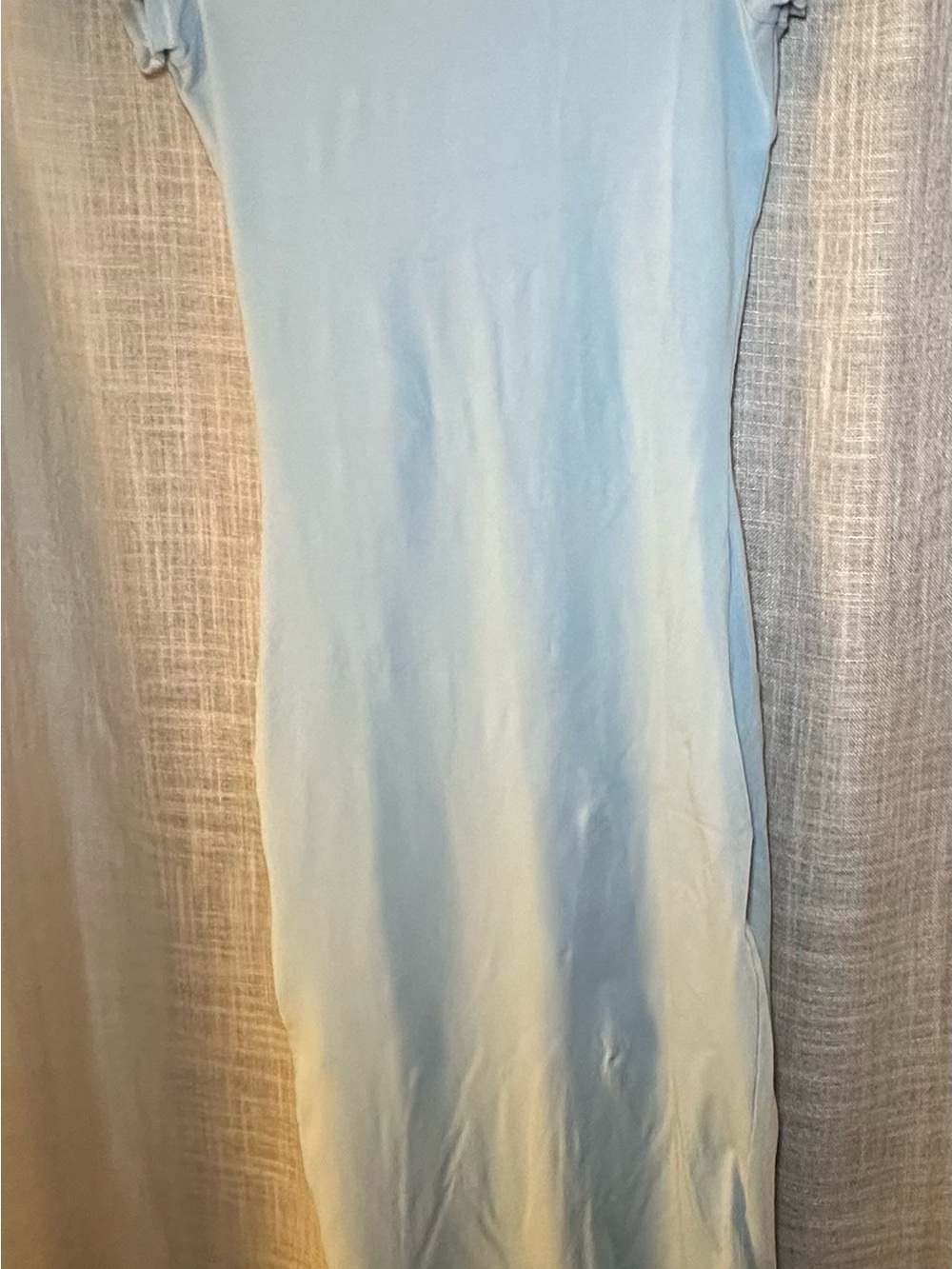 SKIMS Vintage T-Shirt Maxi Dress in a light blue shade.